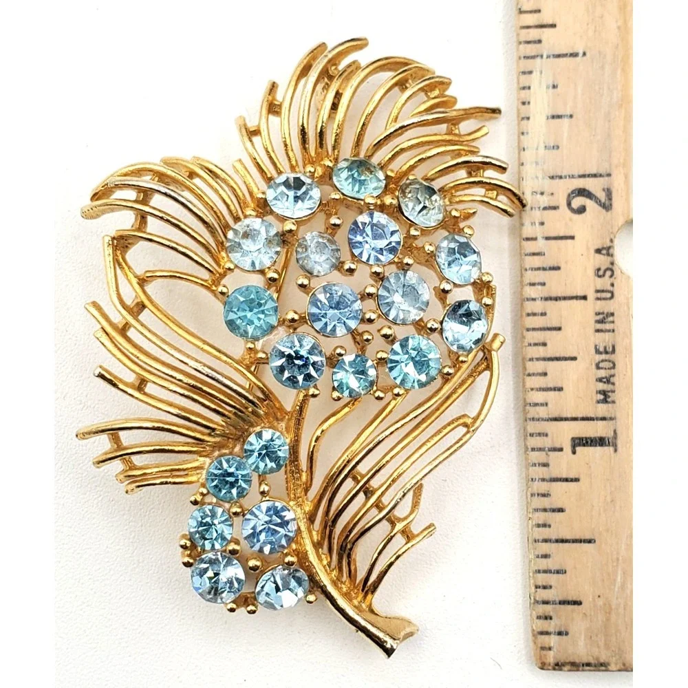 Vintage Lisner Blue Rhinestone Floral Spray Brooch Gold Tone Openwork Pin